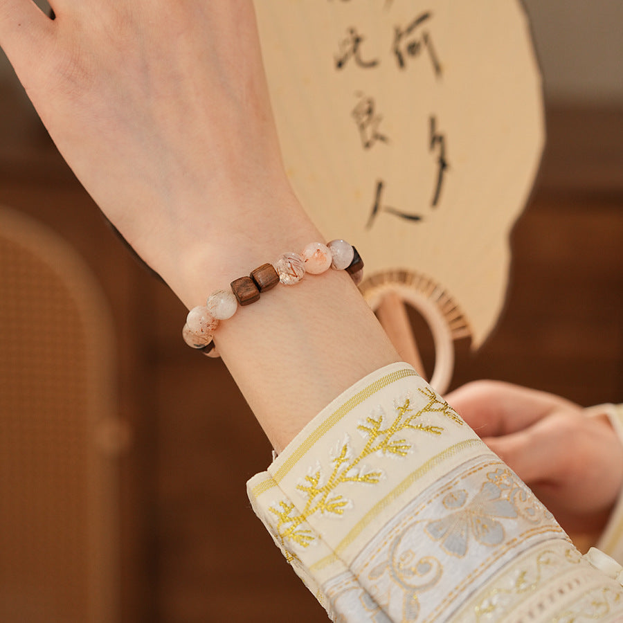 Natural rutilated quartz and sandalwood beaded bracelet — Amberwood Harmony Bracelet by Glazenya.