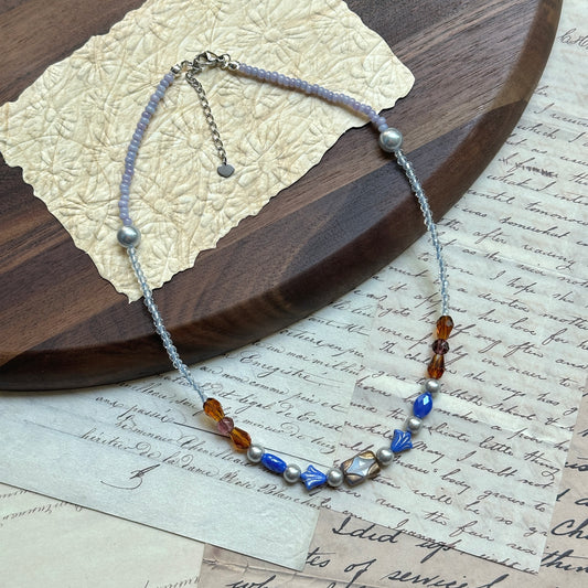 Handmade Amber Ocean Necklace — lampwork focal with alternating amber and sapphire-blue glass beads