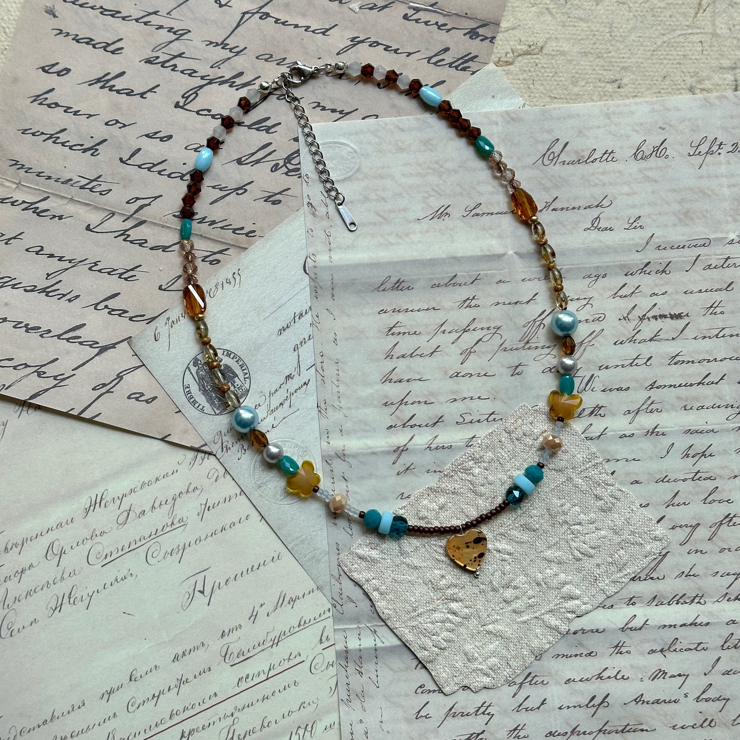 Clear and amber bead strand with pearl accent, lightweight handmade