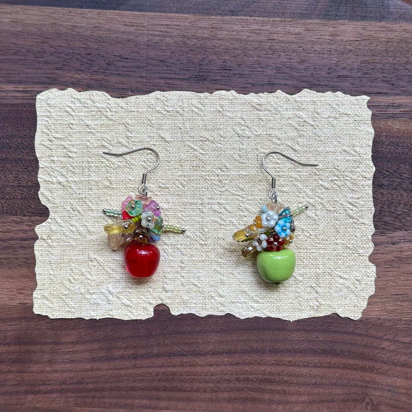 Honeycrisp & Granny Drops — close-up of red Honeycrisp and green Granny apple charms crowned by multicolor flower clusters