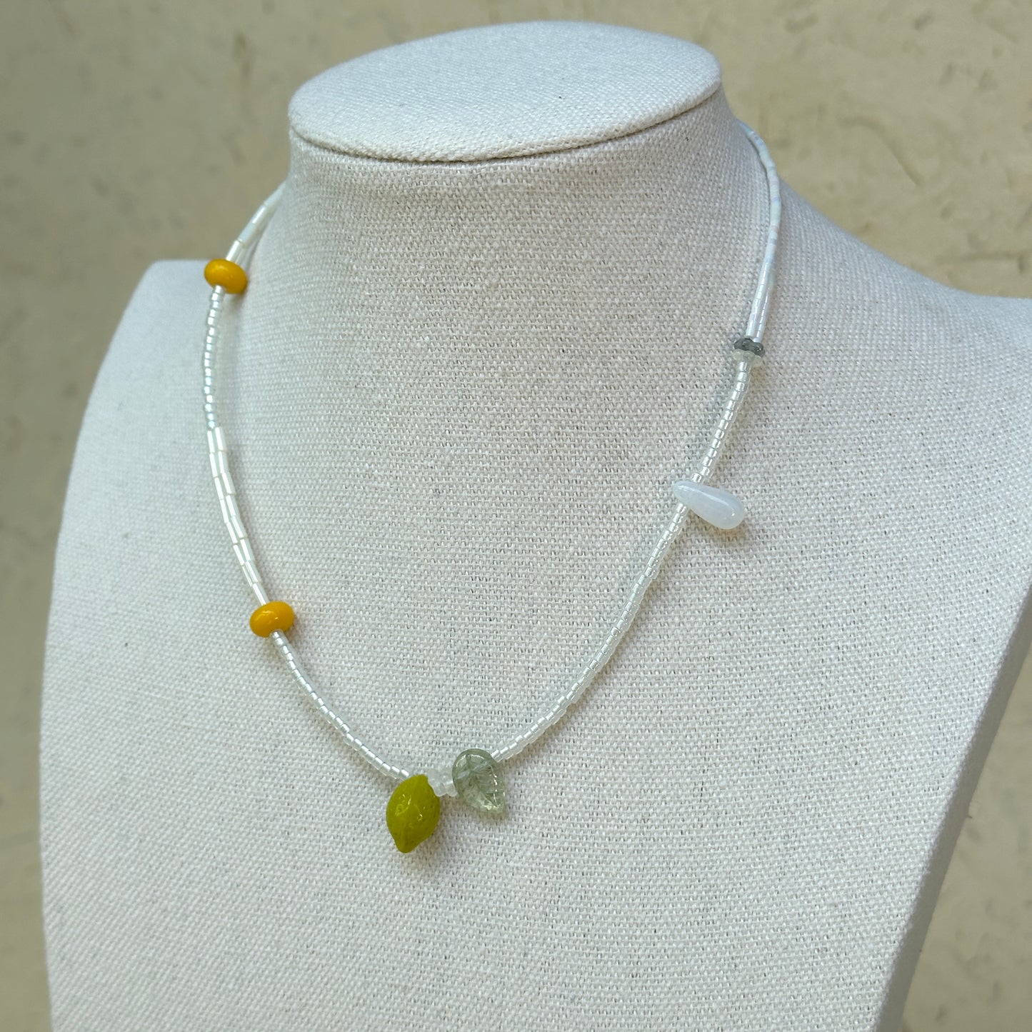 Model wearing Lemon Drop Charm Necklace, fresh everyday style