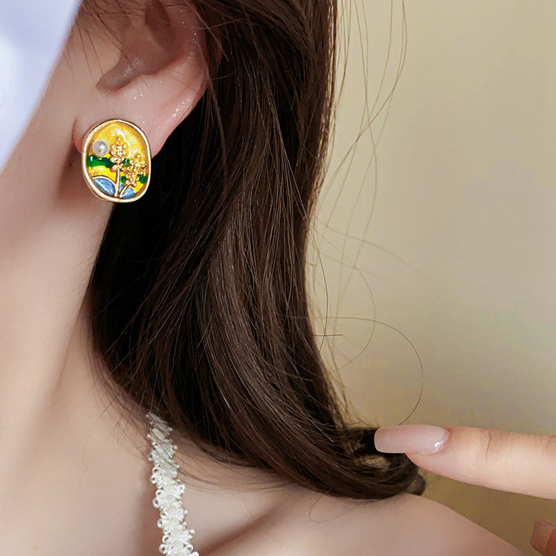 Oval enamel stud earrings in sunlit meadow colors with a pearl accent and gold rim — Sunlit Meadow Pearl Enamel Studs.