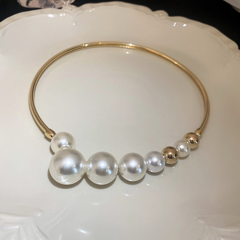 Glazenya Irregular Cross Pearl Choker — close-up of cross motif and pearls