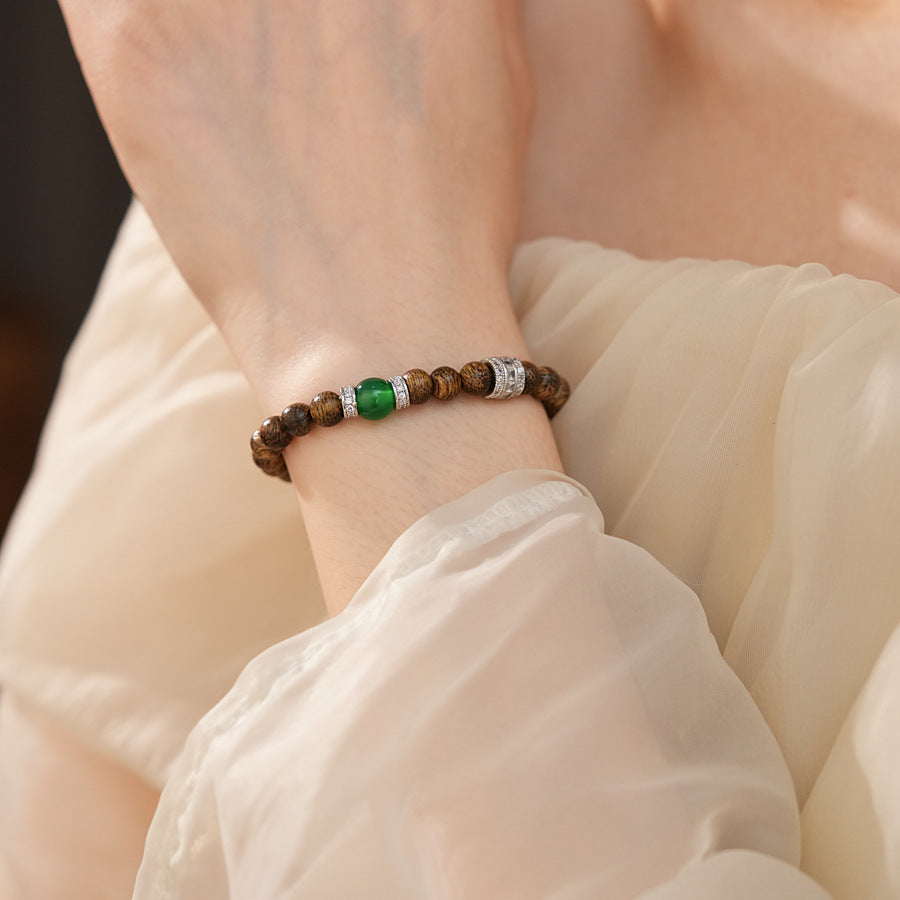 Natural agarwood beaded bracelet with green agate centerpiece and pavé spacers — Verdant Agarwood Bracelet by Glazenya.