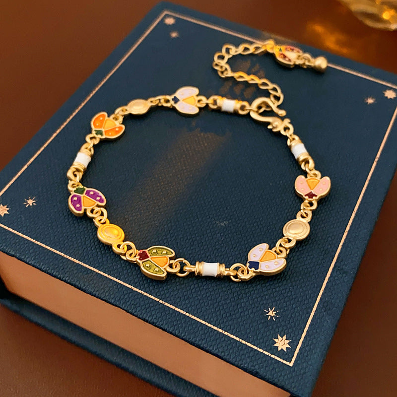 Product size chart for Vintage Enamel Floral Bracelet in golden alloy with enamel flowers