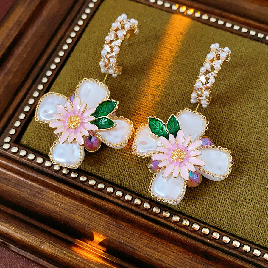 Romantic floral statement earrings with pink blossoms, imitation pearls, and enamel petals — Blossom Pearl Garden Earrings.