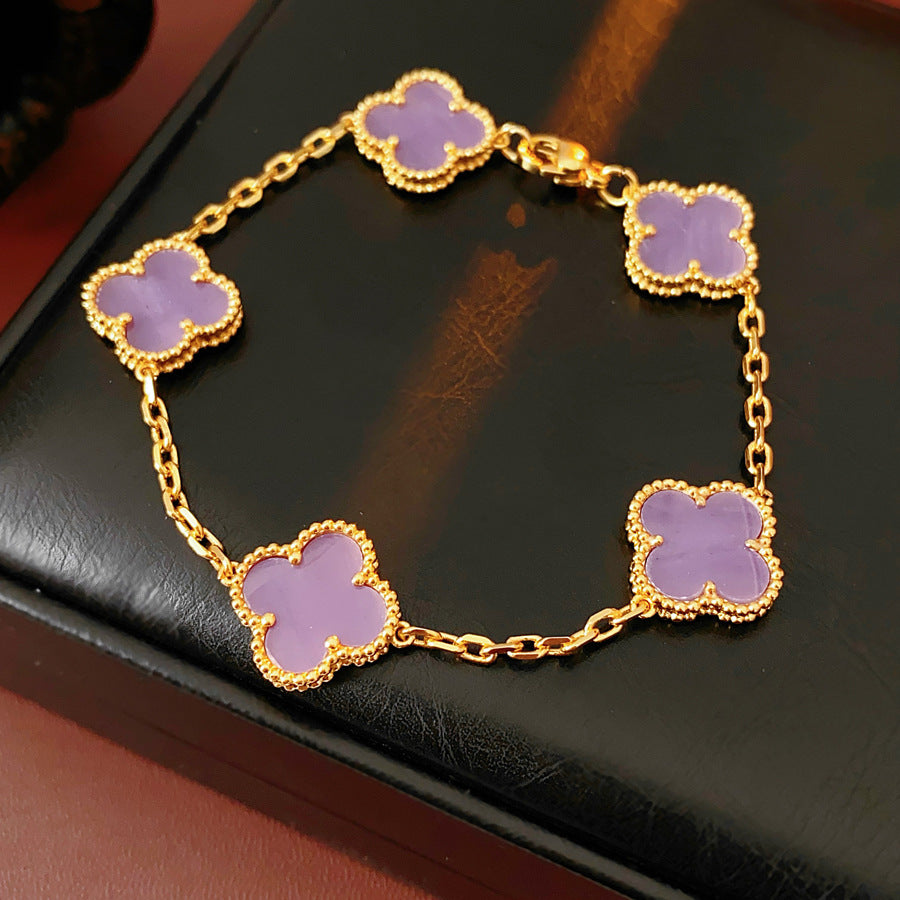Violet Fleur Elegance Bracelet with violet clover motifs and golden beaded frames on chain