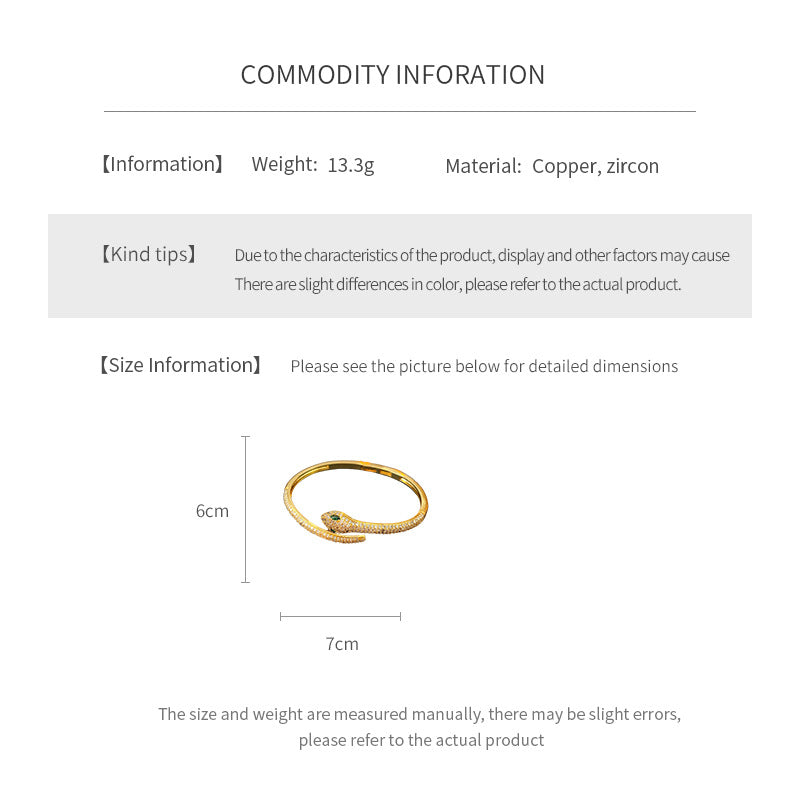 Gold and silver snake-shaped zircon bangles with emerald eyes — Serpent Luxe Bangle by Glazenya.