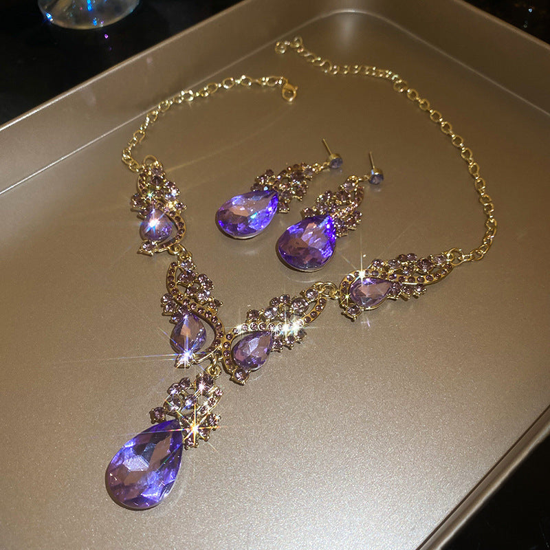 Glazenya Celestial Leaf Zircon Drop Jewelry Set — colorful water-drop zircon stones with leaf motifs; light-luxury necklace set with matching earrings and bracelet/ring variants