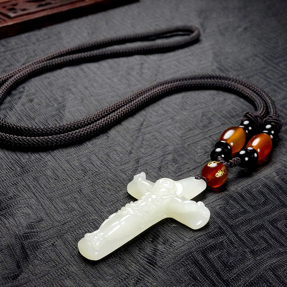 Hetian (nephrite) white jade crucifix pendant close-up – Sacred Light, 48×29×9 mm