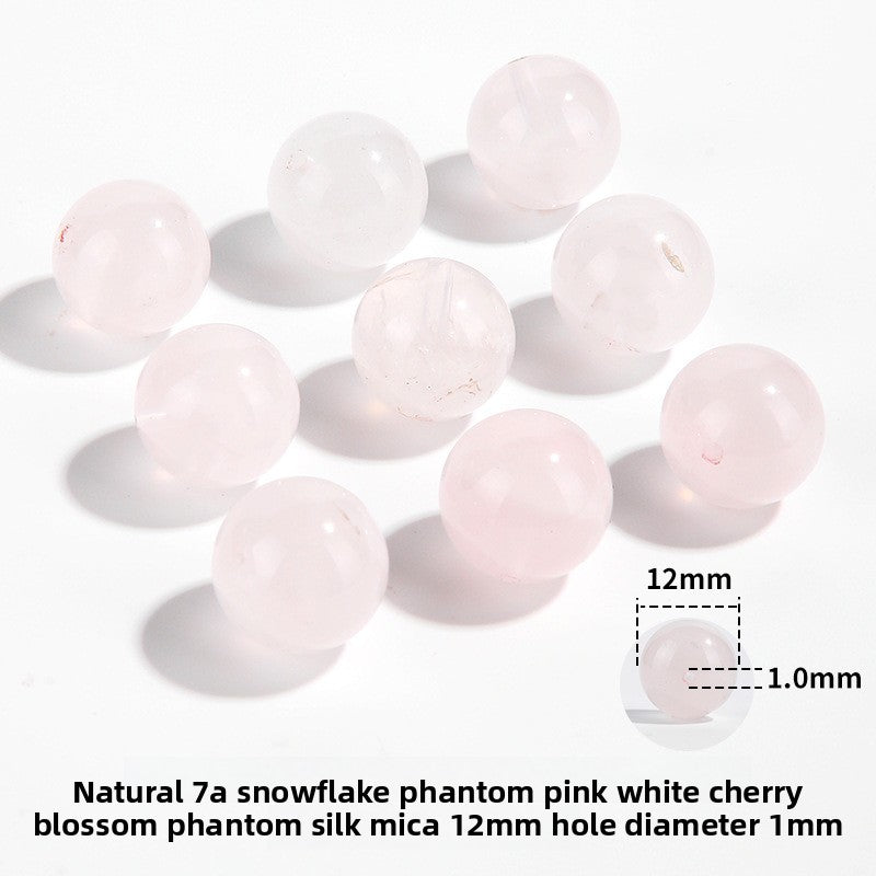 Snow Phantom Quartz round beads with frosty, snowflake-like inclusions—Frost-Mist Bloom (10/12 mm).