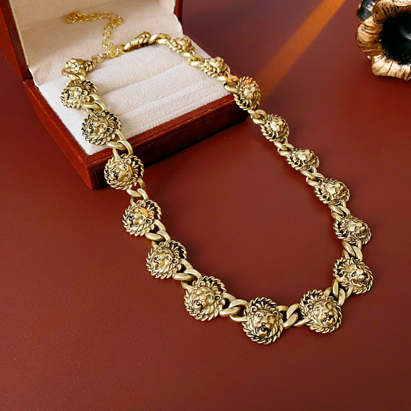 Vintage inspired lion medallion necklace and bracelet set in gold tone alloy with bold relief details