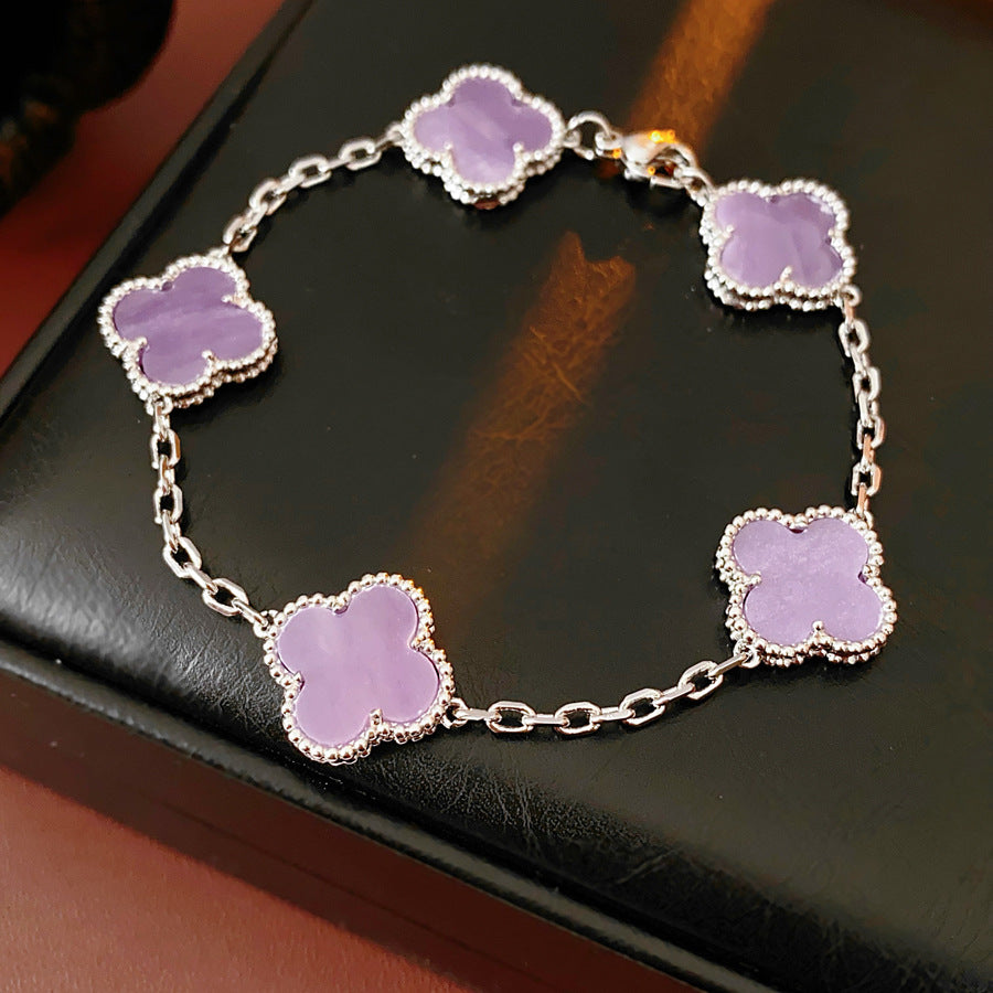 Violet Fleur Elegance Bracelet with violet clover motifs and golden beaded frames on chain