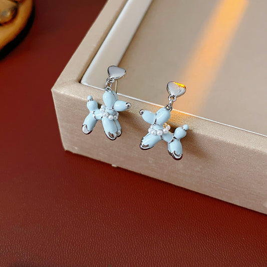 Silver-tone necklace and stud earrings with pastel blue balloon-dog charms — Blue Pup Pendant & Earrings Set.