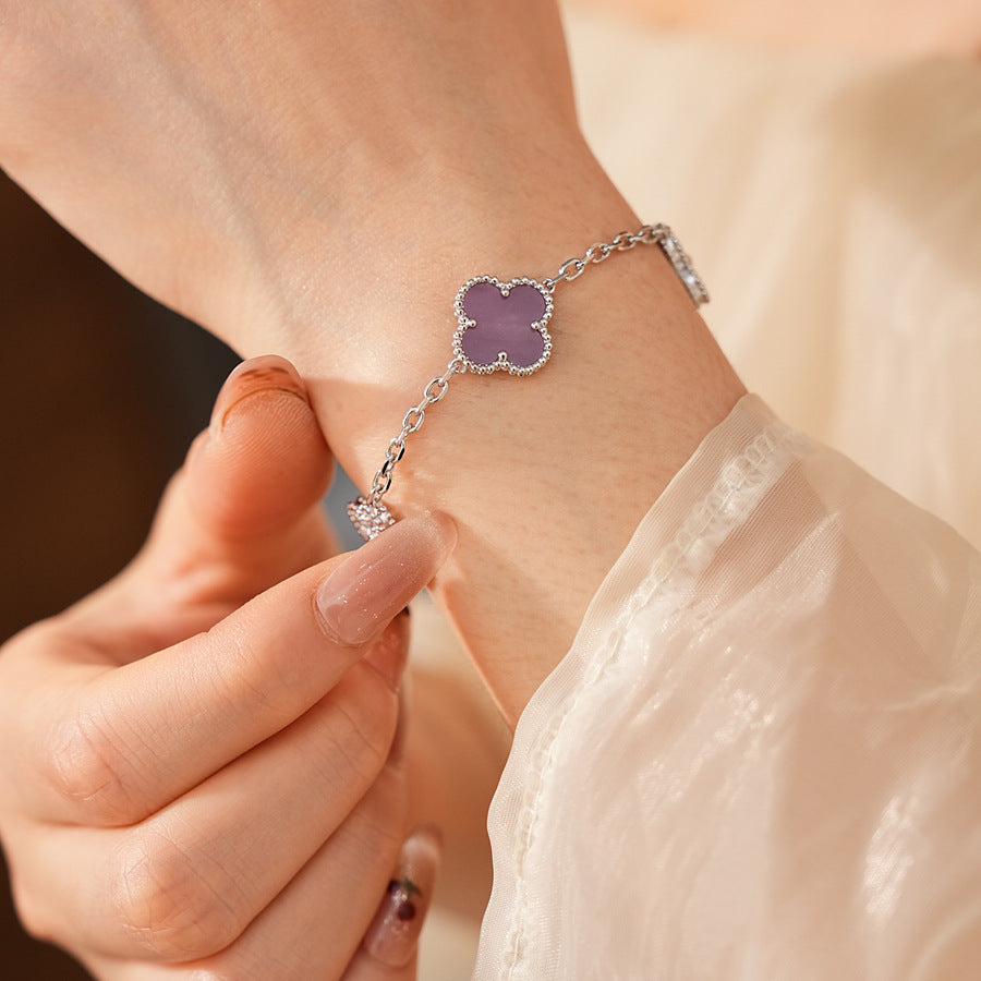 Violet Fleur Elegance Bracelet with violet clover motifs and golden beaded frames on chain