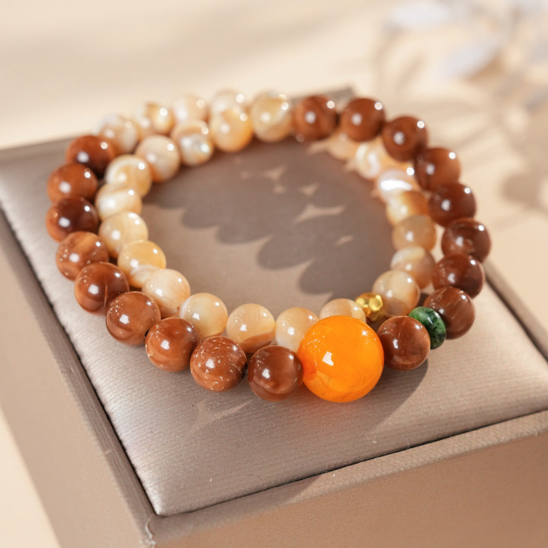Dual-strand natural stone bracelet with amber centerpiece and shell beads in warm brown and beige tones – Glazenya light luxury jewelry