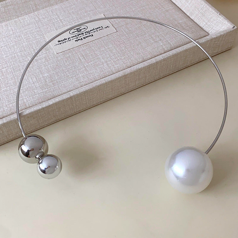 Glazenya Irregular Cross Pearl Choker — close-up of cross motif and pearls