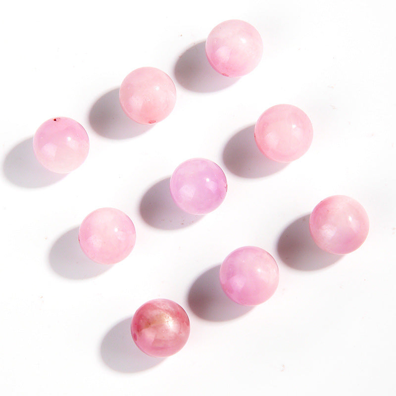 Pink-lilac kunzite round beads with silky glow, assorted 6–13 mm — Sakura Haze.