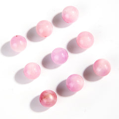 Pink-lilac kunzite round beads with silky glow, assorted 6–13 mm — Sakura Haze.