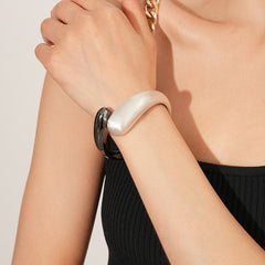Fluid Fusion Duo Bangle in Gold and Silver – sculptural hinged design, high-gloss finish – Glazenya