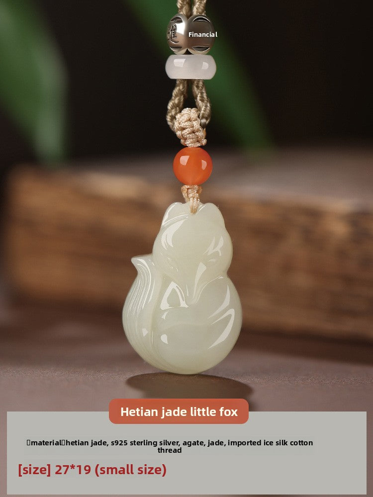 Hand-carved Hetian jade fox pendant on braided cord — Peach Blossom Hetian Jade Fox Pendant