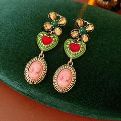 Royal Garden Cameo Set with gold-tone floral links, pink cameo ovals, green enamel hearts, and red stones