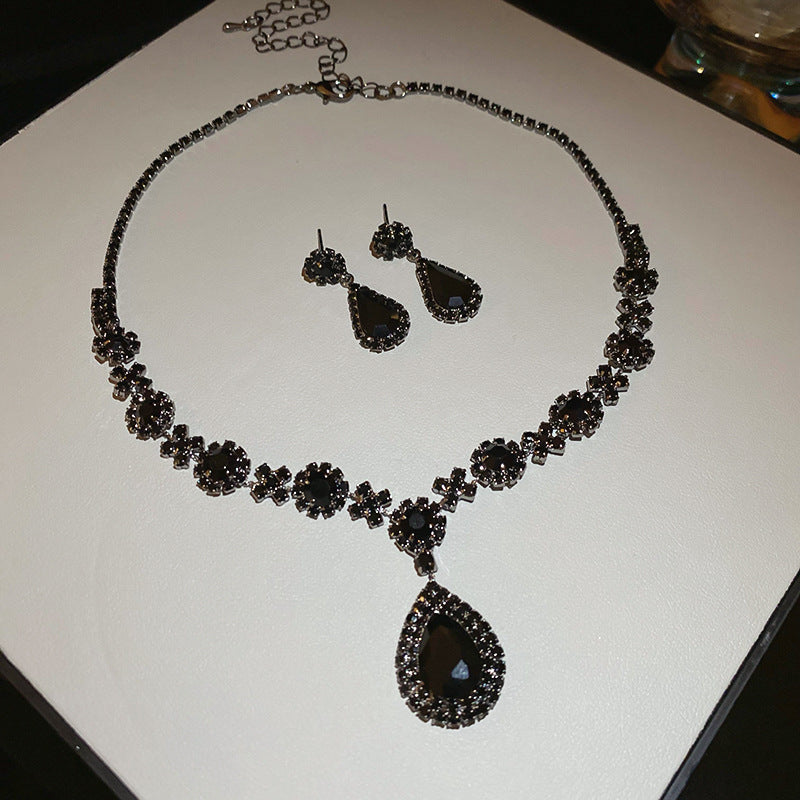 Glazenya Celestial Leaf Zircon Drop Jewelry Set — colorful water-drop zircon stones with leaf motifs; light-luxury necklace set with matching earrings and bracelet/ring variants