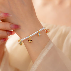 Fleur de Pearl Luxe Set with pearl necklace and matching zircon-accented bracelet, elegant and romantic