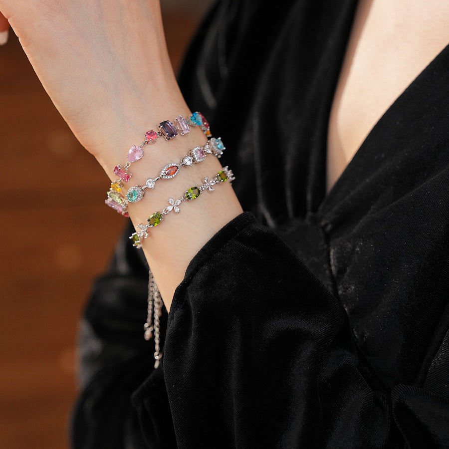 Iridescent Charm Bracelet in vivid multicolor zircon stones on silver-tone copper chain, elegant and lightweight luxury jewelry.