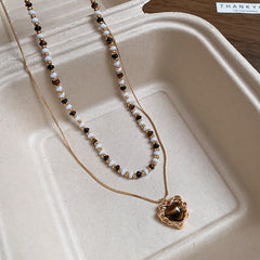 Sun pendant beaded necklace collection — multiple styles displayed
