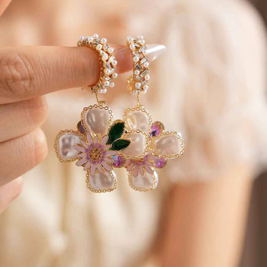 Romantic floral statement earrings with pink blossoms, imitation pearls, and enamel petals — Blossom Pearl Garden Earrings.