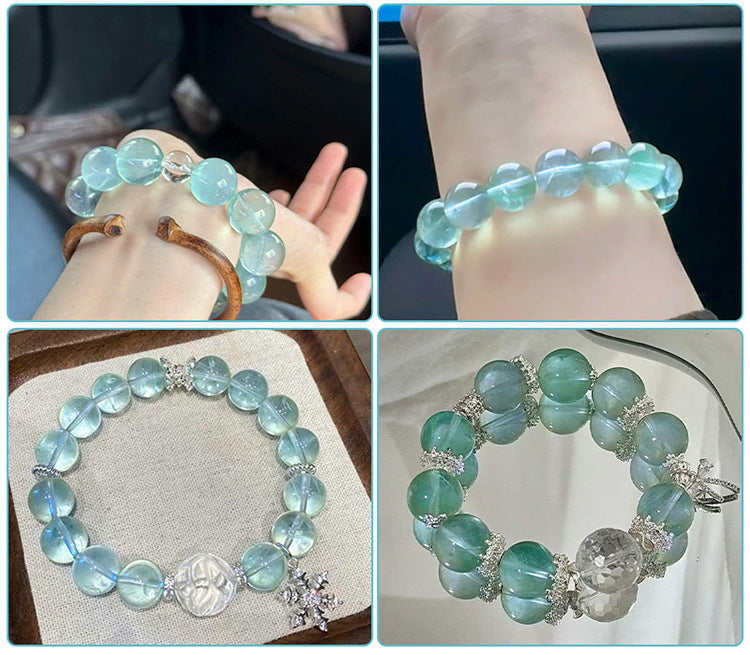 Watery mint-green fluorite round beads with translucent swirls — Mint Spring.