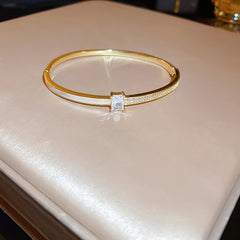 Dazzling Zircon Letter Bangle with copper base and zircon inlay – trendy cold chic jewelry
