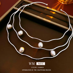Glazenya Irregular Cross Pearl Choker — close-up of cross motif and pearls