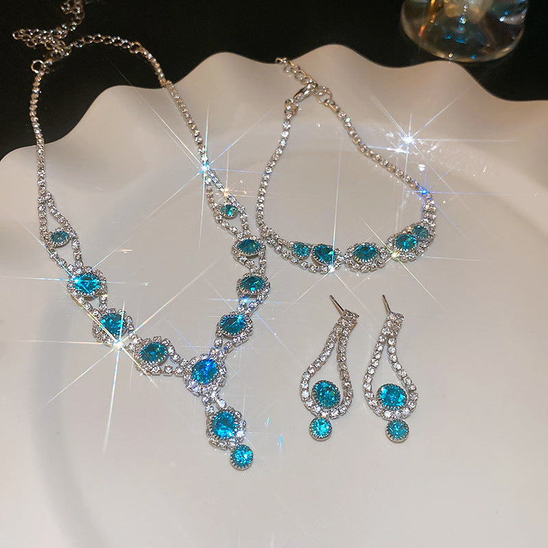 Glazenya Celestial Leaf Zircon Drop Jewelry Set — colorful water-drop zircon stones with leaf motifs; light-luxury necklace set with matching earrings and bracelet/ring variants