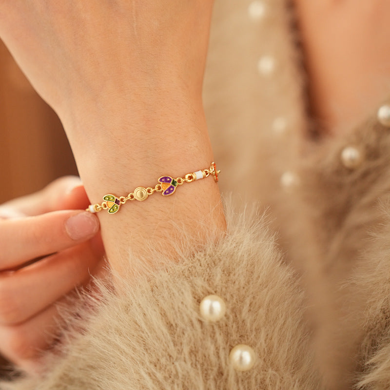 Product size chart for Vintage Enamel Floral Bracelet in golden alloy with enamel flowers