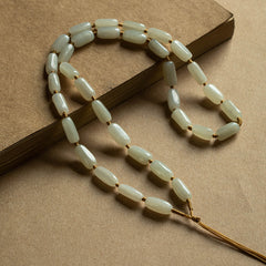 Handcrafted pendant cords wrapped with natural Hetian jade tube beads in light and dark brown — Snowglow Hetian Jade Pendant Cord.