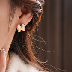 White enamel H letter earrings with gold trim, minimalist chic jewelry