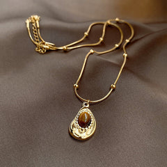 Eternal Moon Heart Necklace in gold plated finish – elegant romantic pendant on lock-bone chain