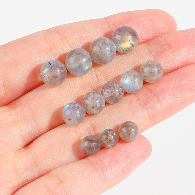 Gray moonstone round beads showing blue adularescence, polished, assorted 4/6/8/9 mm — Frostlit Moon.