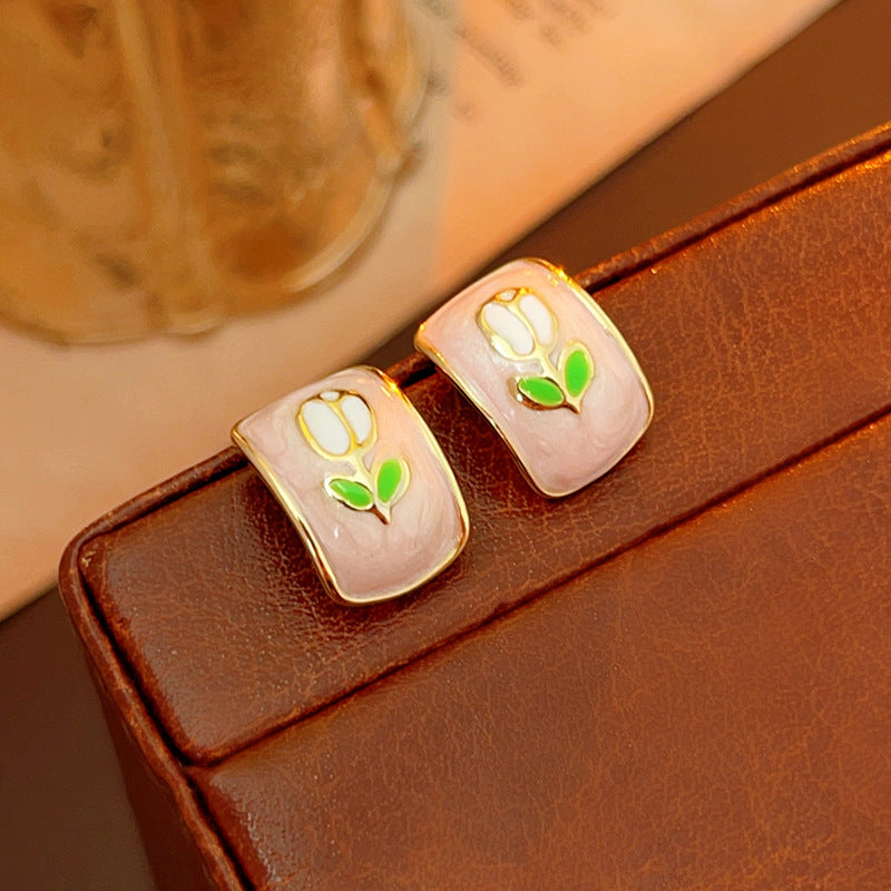 Blush-pink enamel rectangular studs with tulip motif and gold rim — Blush Tulip Cameo Studs.