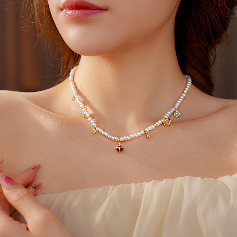 Fleur de Pearl Luxe Set with pearl necklace and matching zircon-accented bracelet, elegant and romantic