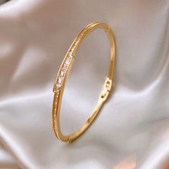 Linea Crystal Channel Bangle in gold tone with channel-set crystals – Glazenya