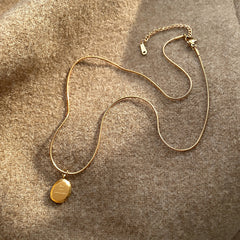 Eternal Moon Heart Necklace in gold plated finish – elegant romantic pendant on lock-bone chain