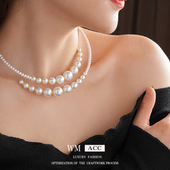 Glazenya Irregular Cross Pearl Choker — close-up of cross motif and pearls