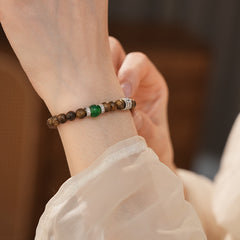 Natural agarwood beaded bracelet with green agate centerpiece and pavé spacers — Verdant Agarwood Bracelet by Glazenya.