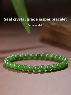 Deep green Hetian (nephrite) jade bracelet with polished round beads — Verdant Fortune Hetian Jade Bracelet.