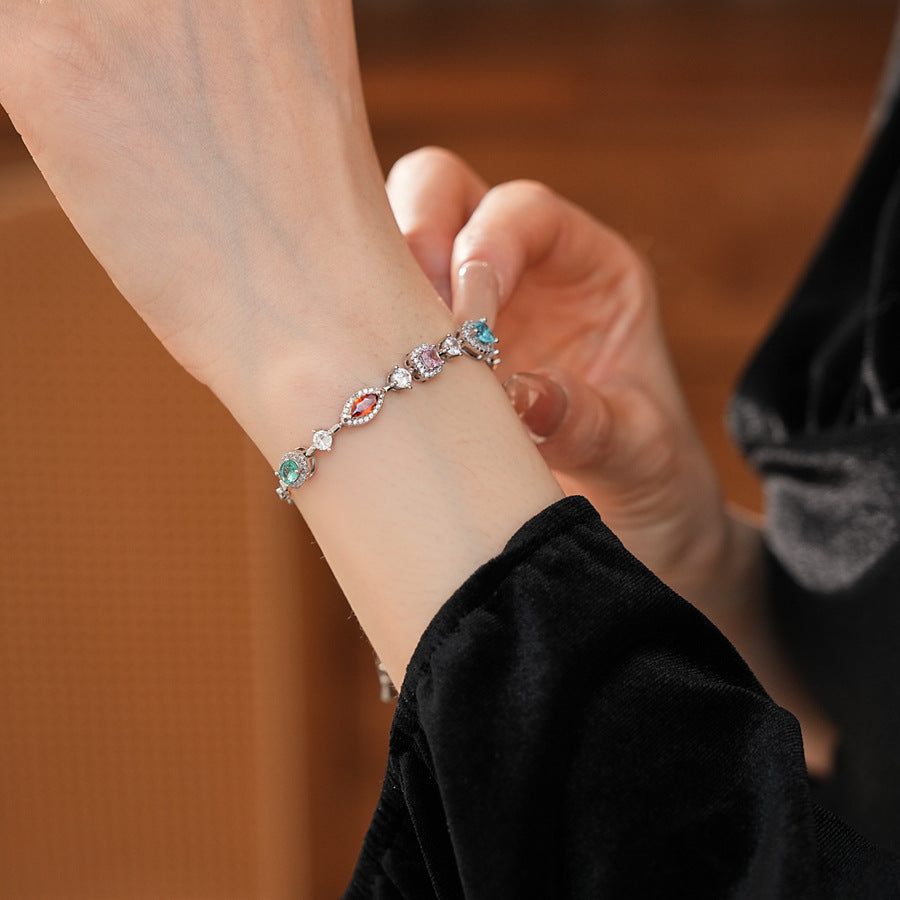 Iridescent Charm Bracelet in vivid multicolor zircon stones on silver-tone copper chain, elegant and lightweight luxury jewelry.