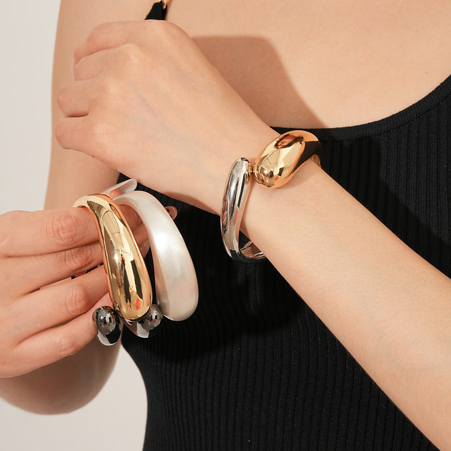 Fluid Fusion Duo Bangle in Gold and Silver – sculptural hinged design, high-gloss finish – Glazenya