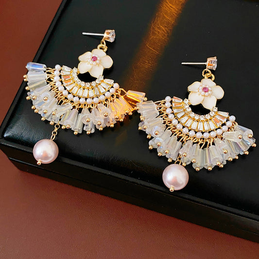 Floral fan chandelier earrings with layered crystal fringe and pearl drops — Blossom Fan Pearl Fringe Earrings.
